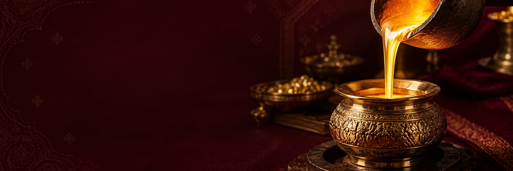 Molten gold being poured into an ornate brass vessel